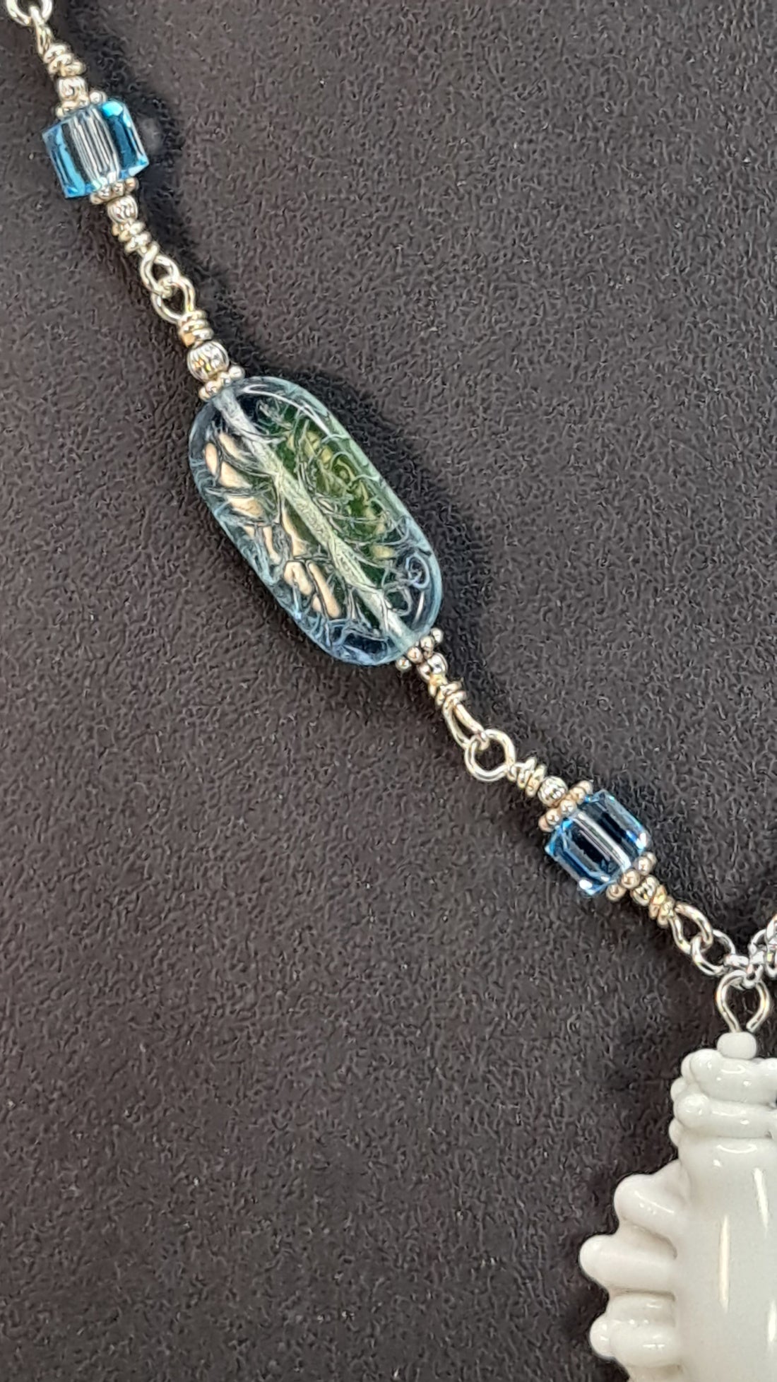 White ceramic Conch Shell necklace wire wrapped with Blue-Green Glass beads