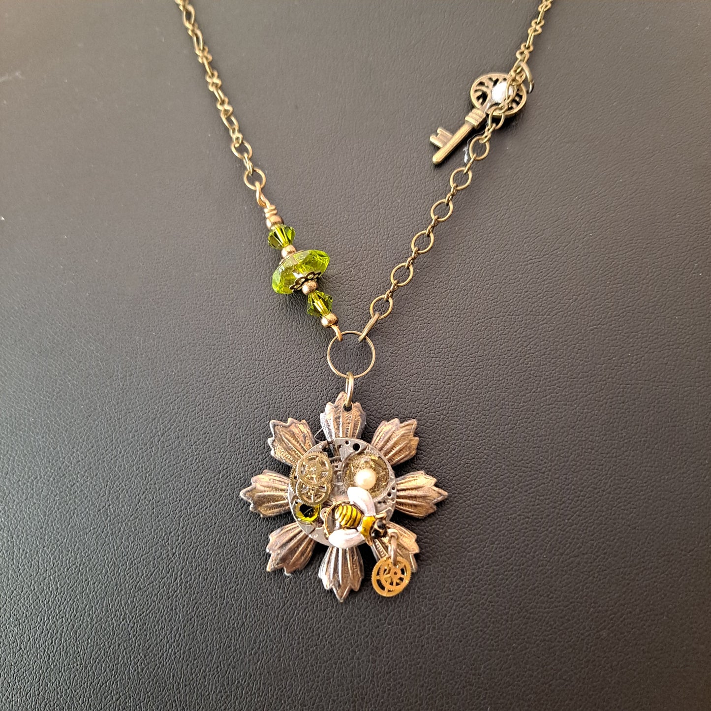 Vintage watch parts, pearl, peridot cabochon, Swarovski crystals & painted bee