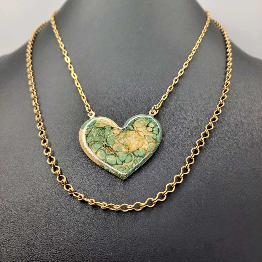 Green & cream painted heart necklace