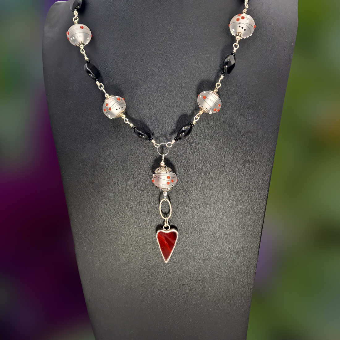 Red glass heart in pewter with mixed glass beads