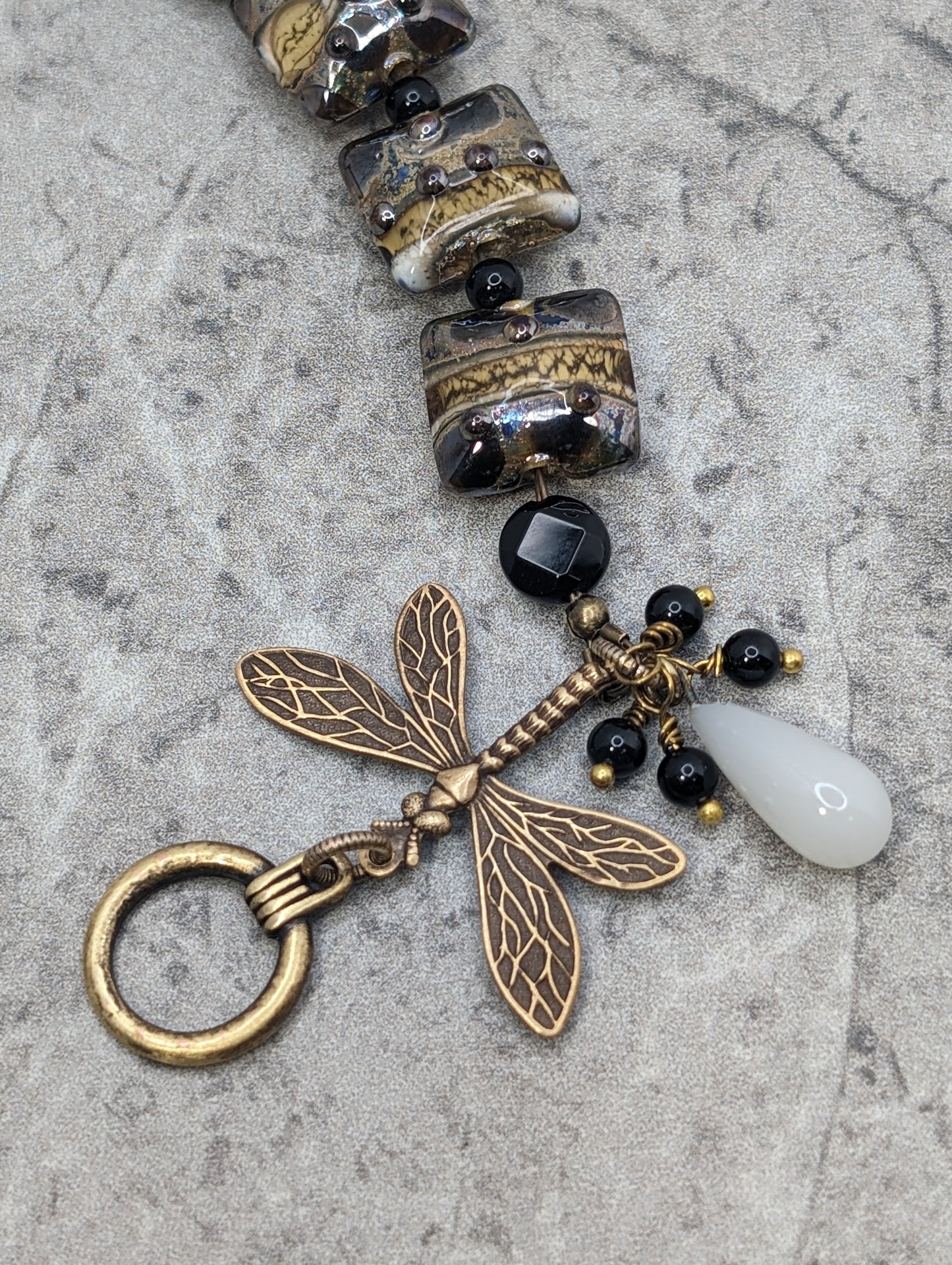 Lamp Work Glass Beads in Black & Beige with Brass Dragonfly Bracelet