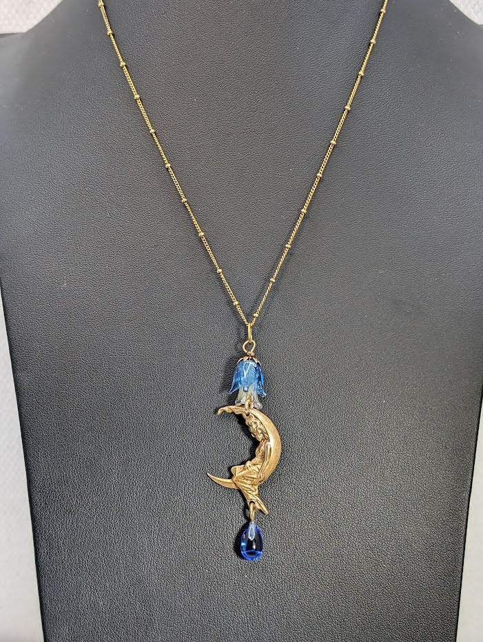 Crescent Moon With Lady Brass Necklace with Blue Glass Accents