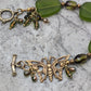 Green Frosted Glass Bracelet with Brass Butterfly