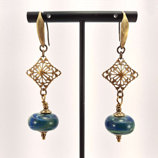 Brass Filigree earrings accented with a blue green ceramic bead